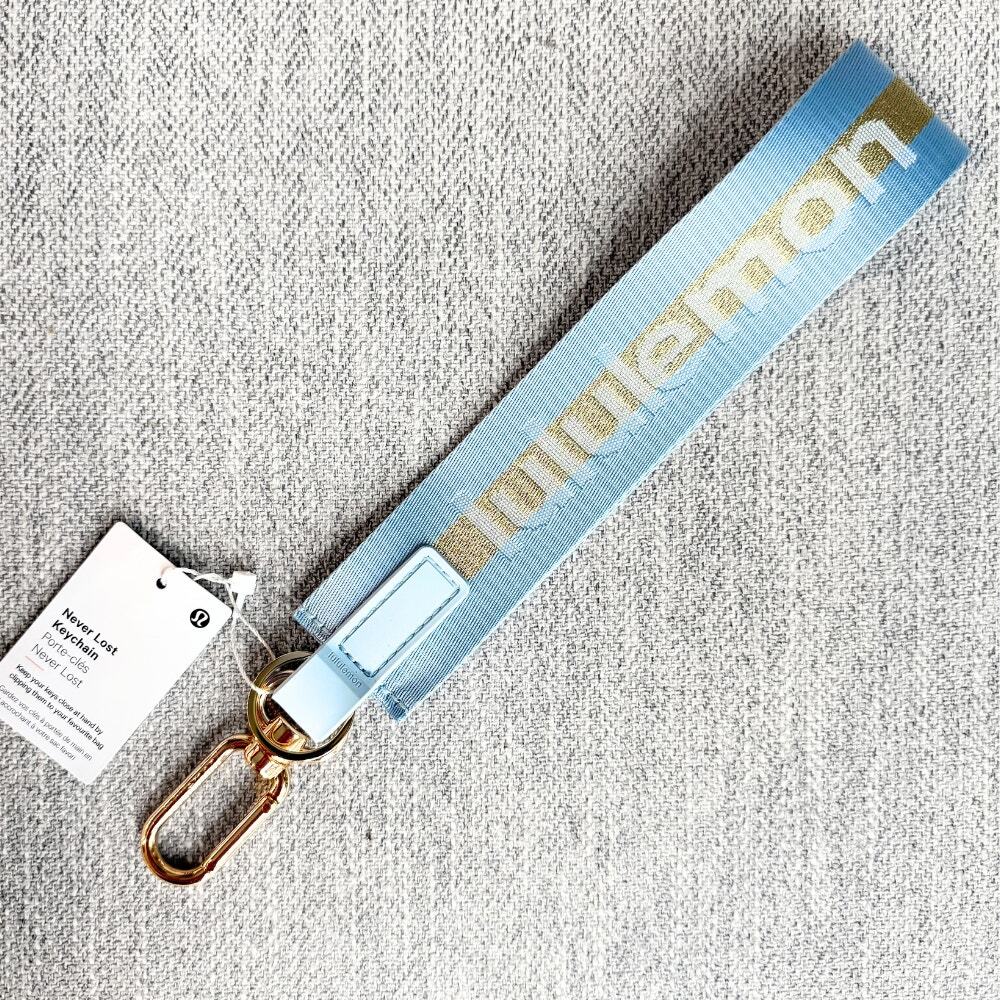 NEW Lululemon Never lost Keychain Wordmark Baby Blue Gold